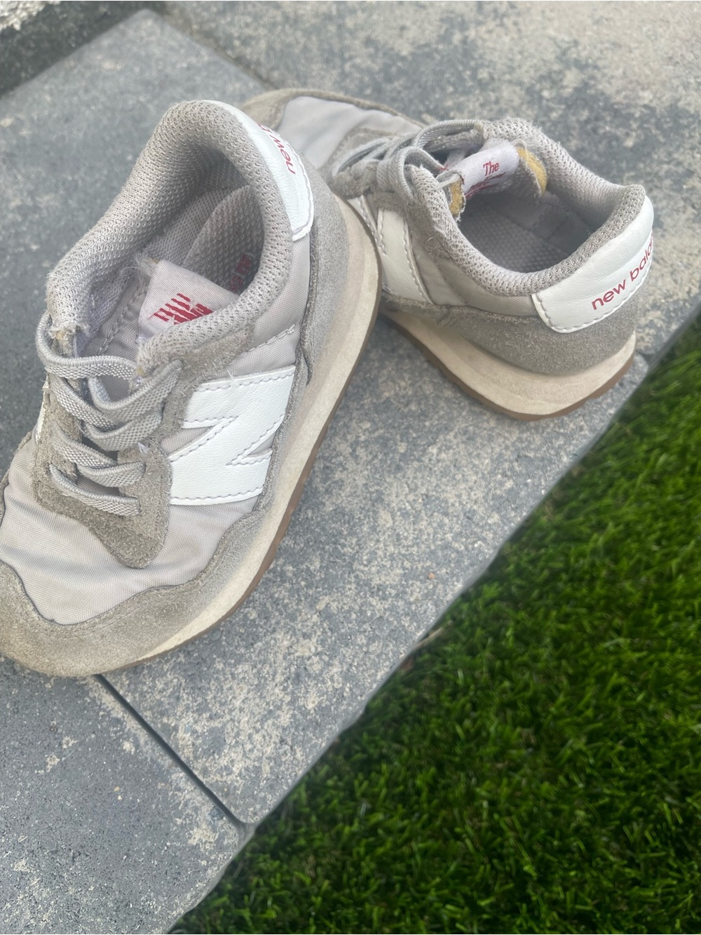 New Balance Kids Sneakers in Gray and White